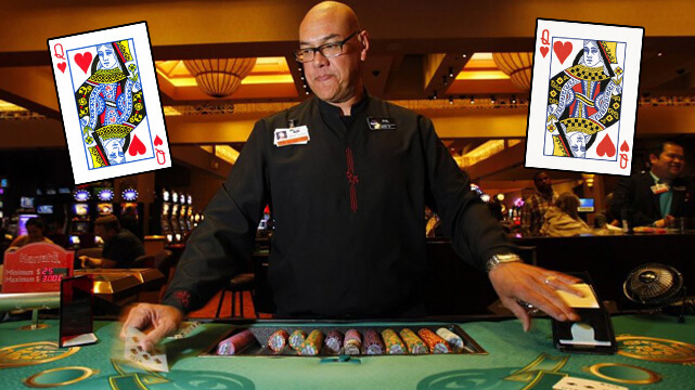 Casino Dealer at Blackjack Table, Two Queen of Hearts Cards