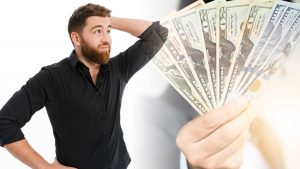 Man Thinking Holding Cash