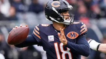 caleb williams throwing a football