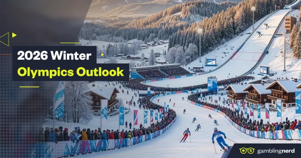 2026 Winter Olympics outlook graphic showing a snowy alpine ski venue with athletes racing downhill, packed spectator stands, mountain chalets, and a large ski jump in the background