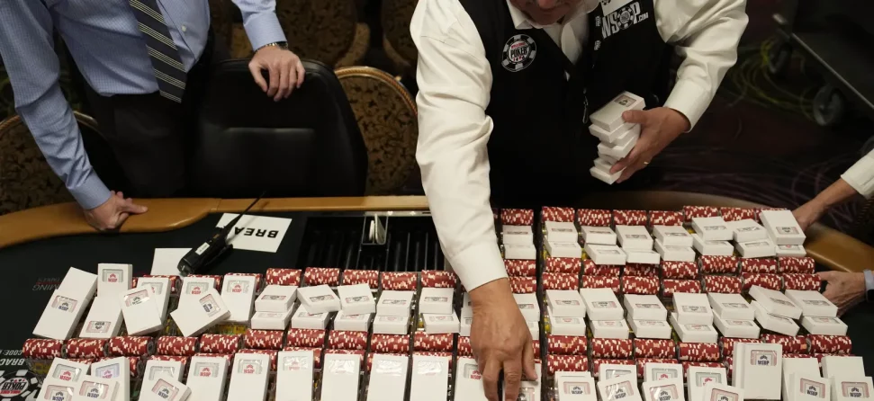 Dealer stacking chips at the WSOP