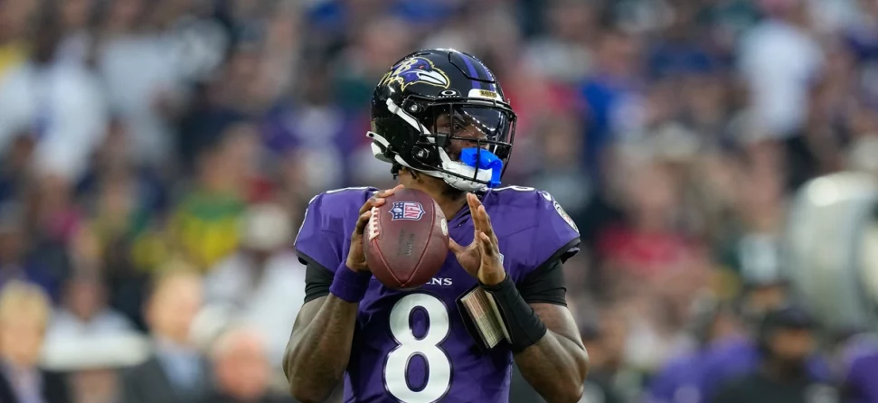 Ravens QB Lamar Jackson preparing to throw a pass