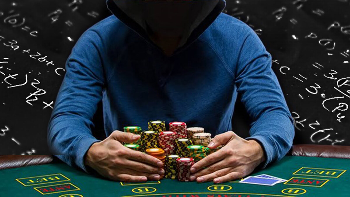 Someone holding poker chips