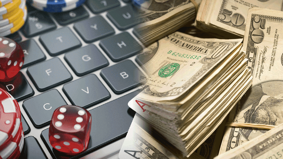 Casino Paraphernalia on a Laptop on Left and Stacks of Cash on the Right