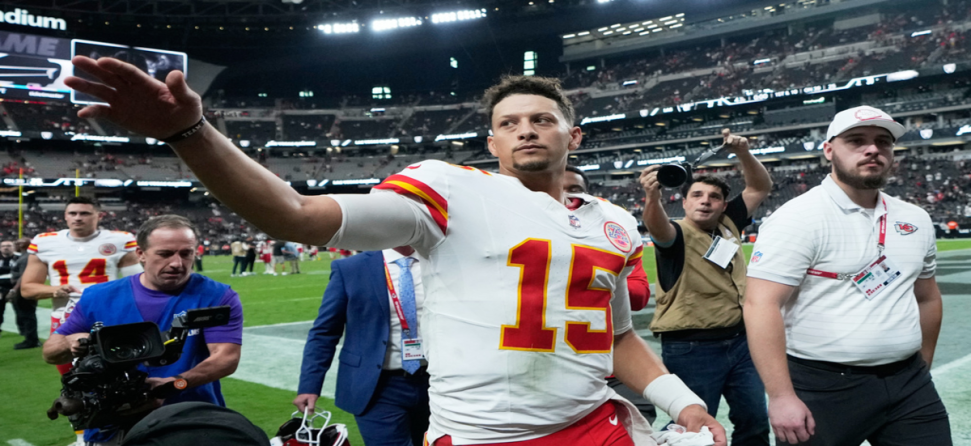 Patrick Mahomes walking off after a win